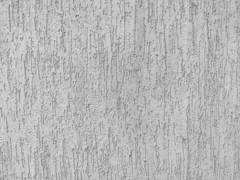 Texture of the grey plaster bark beetle on the wall. Seamless texture. The texture of the plaster is bark beetle on the wall. Seamless grey texture royalty free stock images